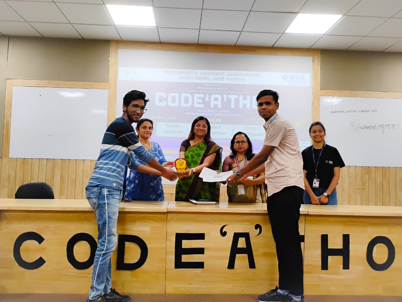 Sagar and Atharva receiving the 2nd Runner-Up award at CODEATHON 2024